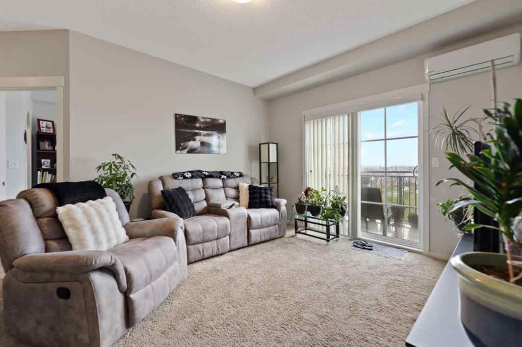 MLS® A2218475 - Unit #6411 755 Copperpond Boulevard SE in Copperfield Calgary, Residential