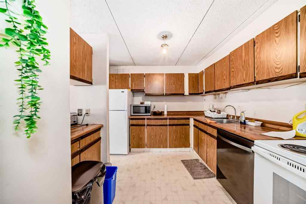 MLS® A2218590 - Unit #215 5204 Dalton Drive NW in Dalhousie Calgary, Residential