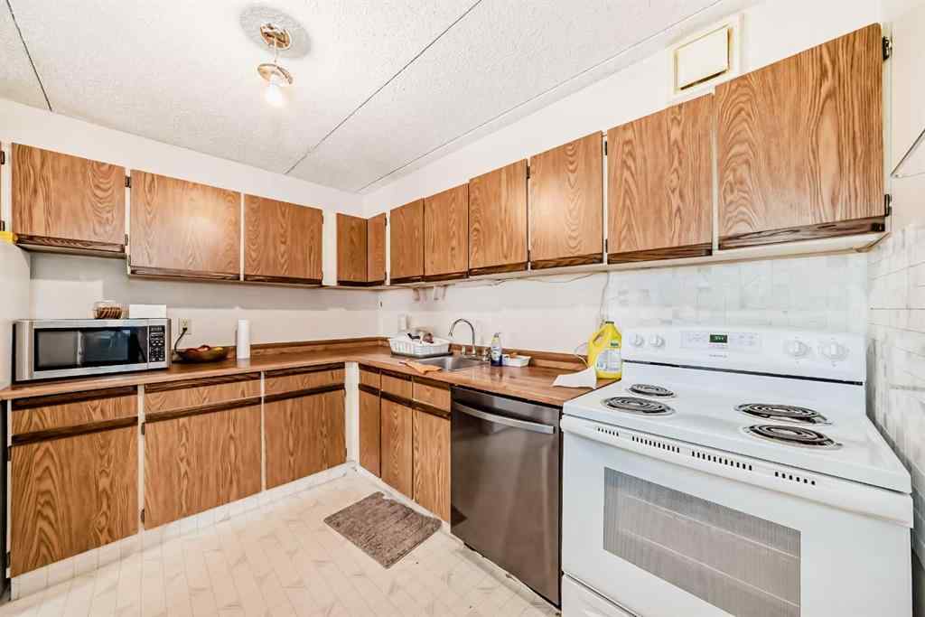 MLS® A2218590 - Unit #215 5204 Dalton Drive NW in Dalhousie Calgary, Residential