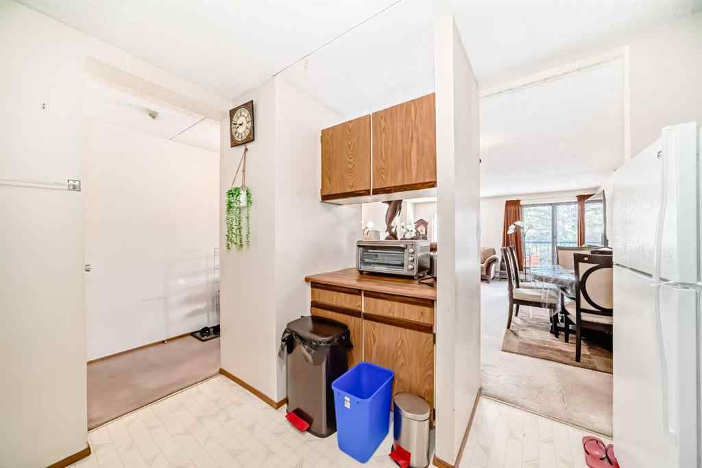 MLS® A2218590 - Unit #215 5204 Dalton Drive NW in Dalhousie Calgary, Residential