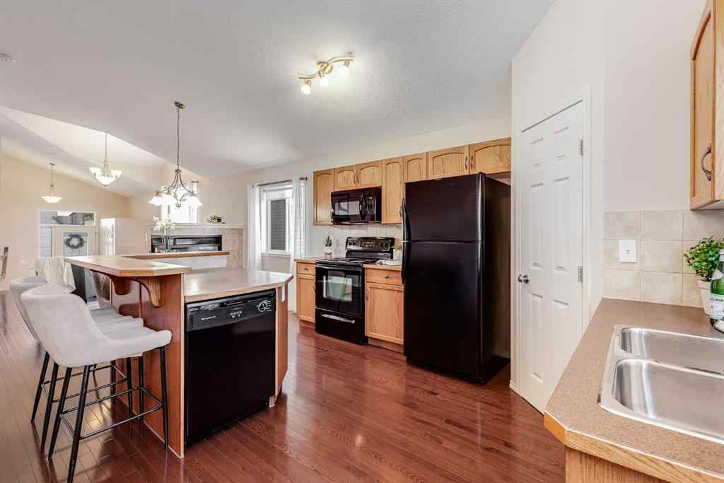 MLS® A2218698 - 1046 Channelside Way SW in Canals Airdrie, Residential