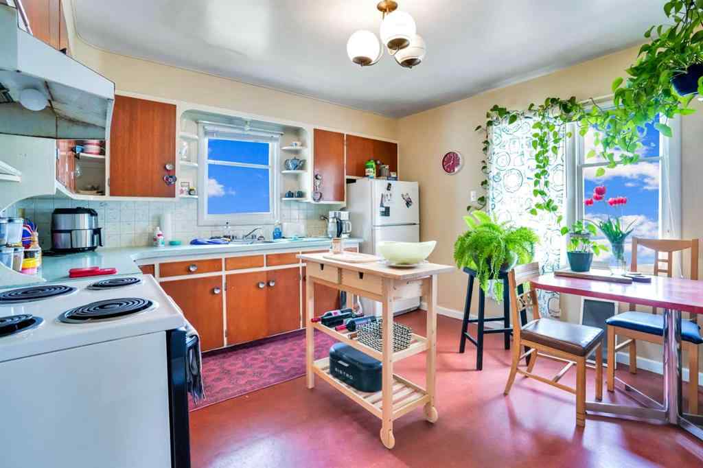 MLS® A2219374 - 112 29 Avenue NW in Tuxedo Park Calgary, Multi-Family