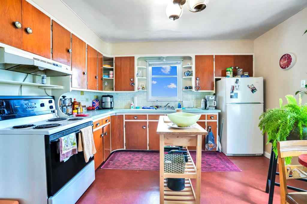 MLS® A2219374 - 112 29 Avenue NW in Tuxedo Park Calgary, Multi-Family