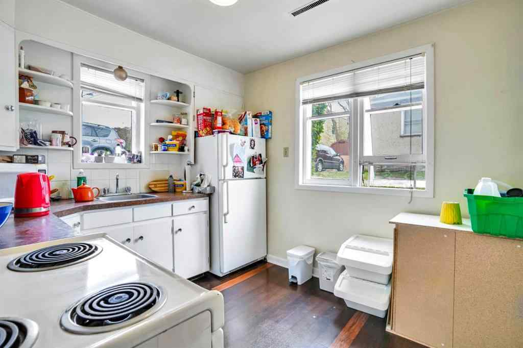 MLS® A2219374 - 112 29 Avenue NW in Tuxedo Park Calgary, Multi-Family