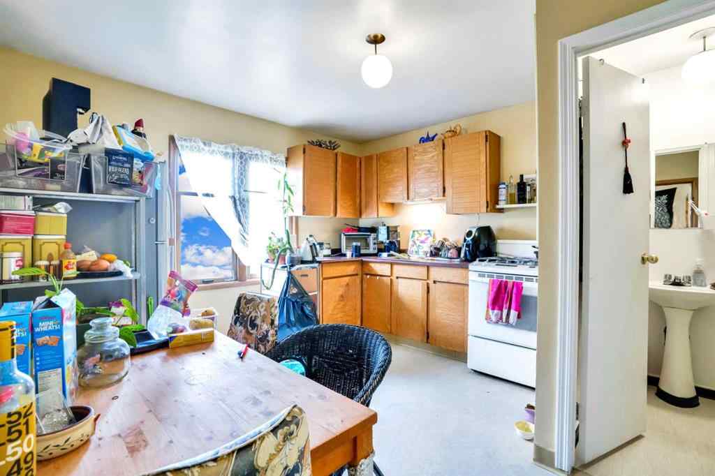 MLS® A2219374 - 112 29 Avenue NW in Tuxedo Park Calgary, Multi-Family