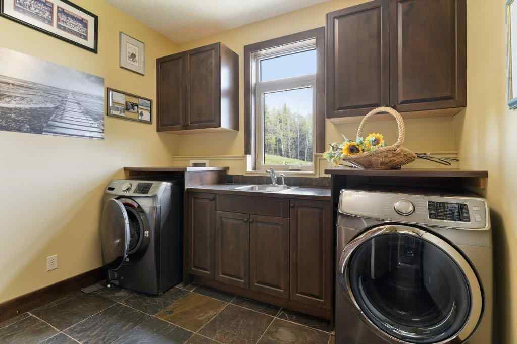 MLS® A2219597 - 316042 160 Avenue W in Priddis Creek Estate Rural Foothills County, Residential