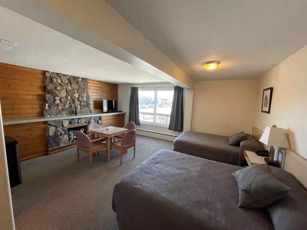 MLS® A2219825 - 114 Park Street  in Mountain View Hinton, Commercial