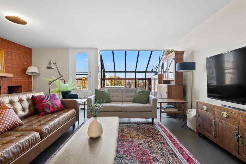 MLS® A2219888 - Unit #418 1505 8 Avenue NW in Hillhurst Calgary, Residential