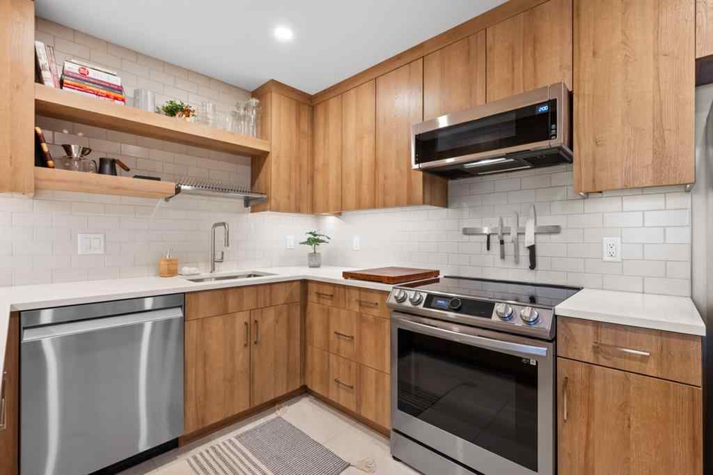 MLS® A2219888 - Unit #418 1505 8 Avenue NW in Hillhurst Calgary, Residential