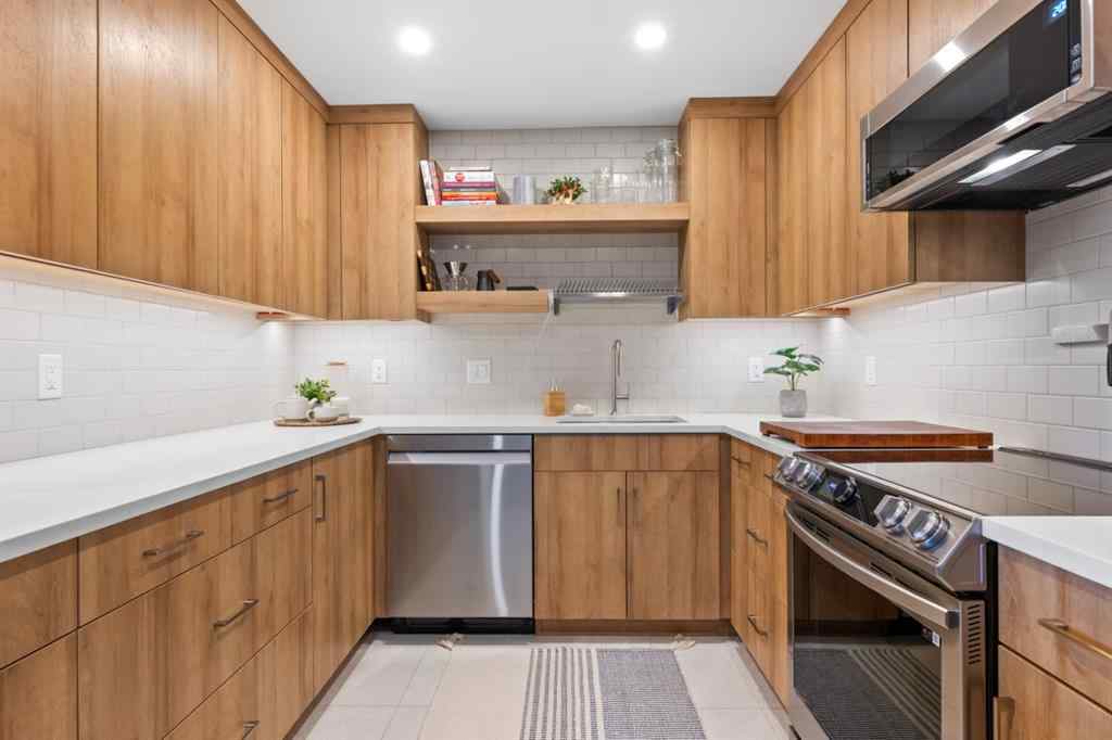 MLS® A2219888 - Unit #418 1505 8 Avenue NW in Hillhurst Calgary, Residential