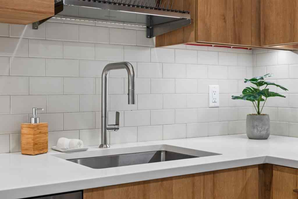 MLS® A2219888 - Unit #418 1505 8 Avenue NW in Hillhurst Calgary, Residential