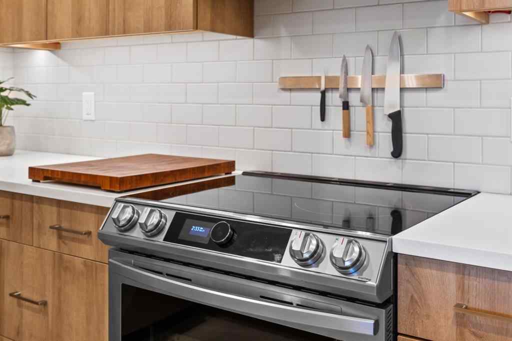 MLS® A2219888 - Unit #418 1505 8 Avenue NW in Hillhurst Calgary, Residential