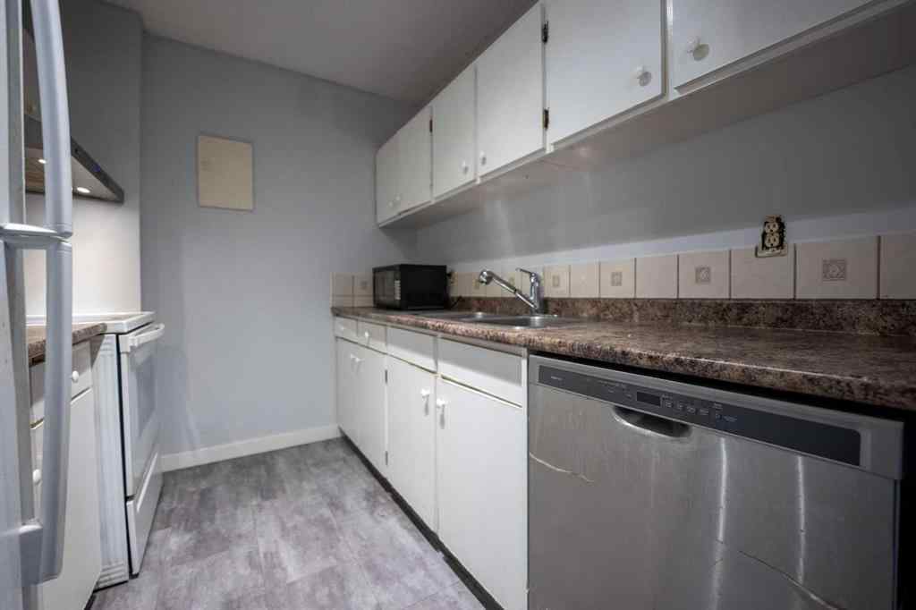 MLS® A2219979 - Unit #710 4944 Dalton Drive NW in Dalhousie Calgary, Residential