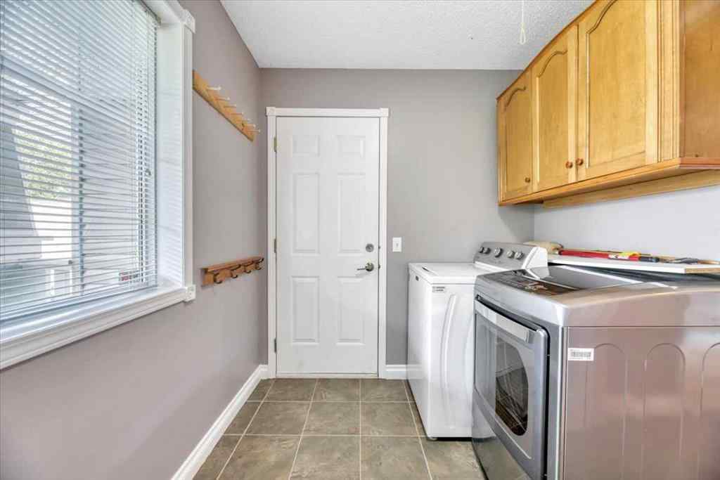 MLS® A2220653 - 27 Henderson Road  in NONE Langdon, Residential