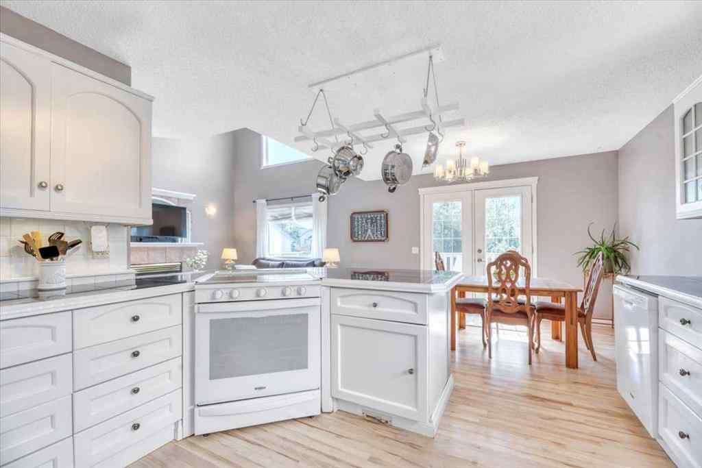 MLS® A2220653 - 27 Henderson Road  in NONE Langdon, Residential
