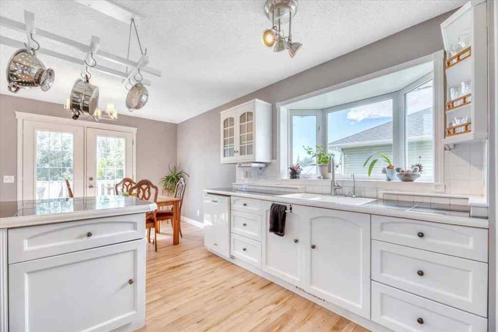 MLS® A2220653 - 27 Henderson Road  in NONE Langdon, Residential