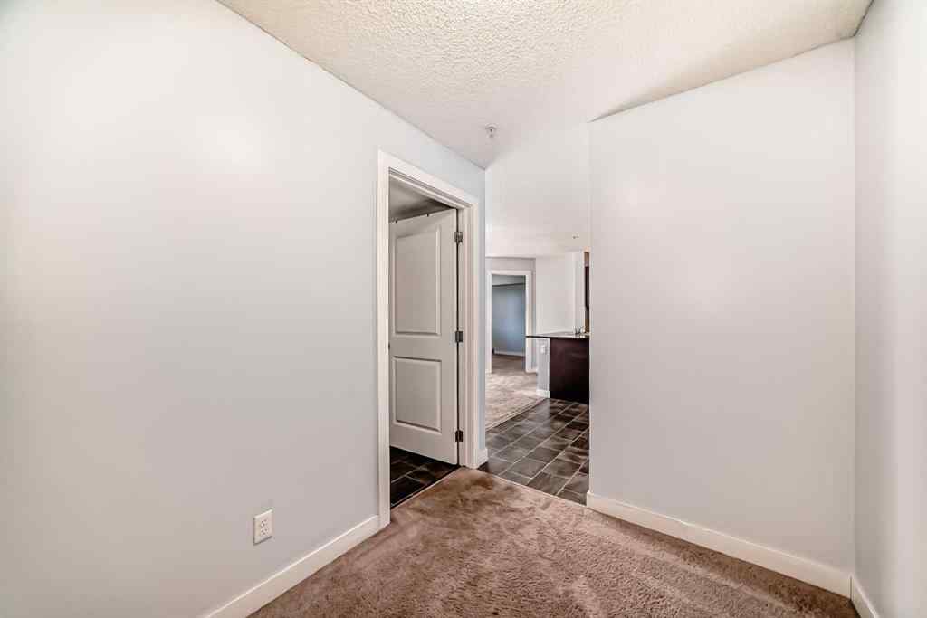 MLS® A2220772 - Unit #205 5 Saddlestone Way NE in Saddle Ridge Calgary, Residential