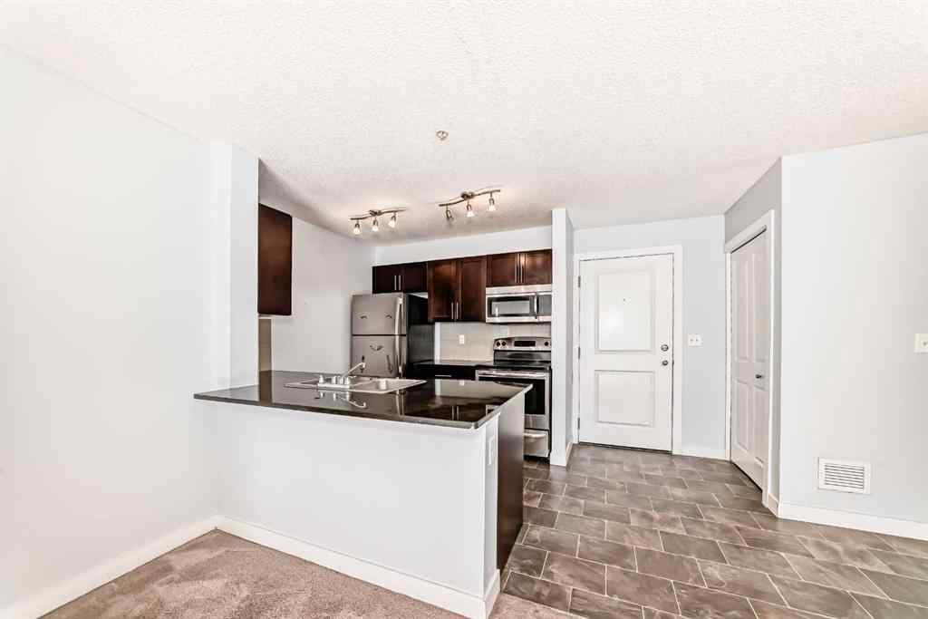 MLS® A2220772 - Unit #205 5 Saddlestone Way NE in Saddle Ridge Calgary, Residential