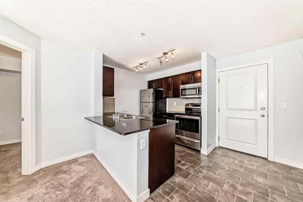 MLS® A2220772 - Unit #205 5 Saddlestone Way NE in Saddle Ridge Calgary, Residential