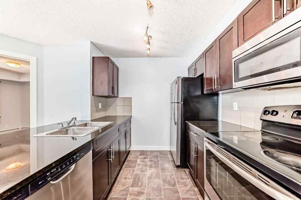 MLS® A2220772 - Unit #205 5 Saddlestone Way NE in Saddle Ridge Calgary, Residential
