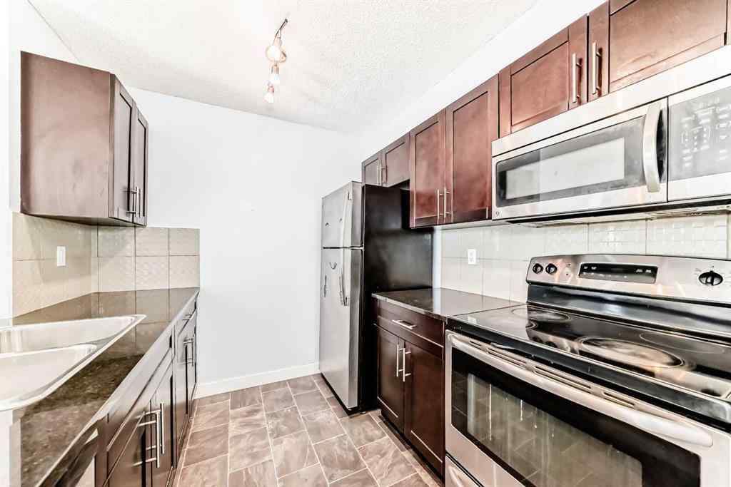 MLS® A2220772 - Unit #205 5 Saddlestone Way NE in Saddle Ridge Calgary, Residential