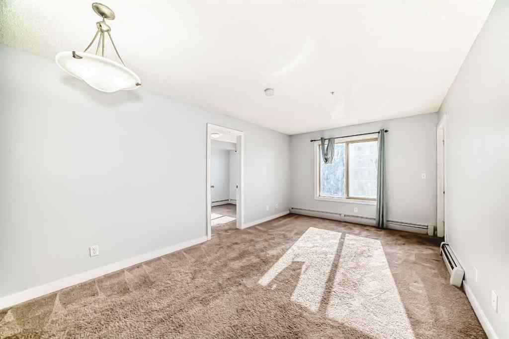 MLS® A2220772 - Unit #205 5 Saddlestone Way NE in Saddle Ridge Calgary, Residential