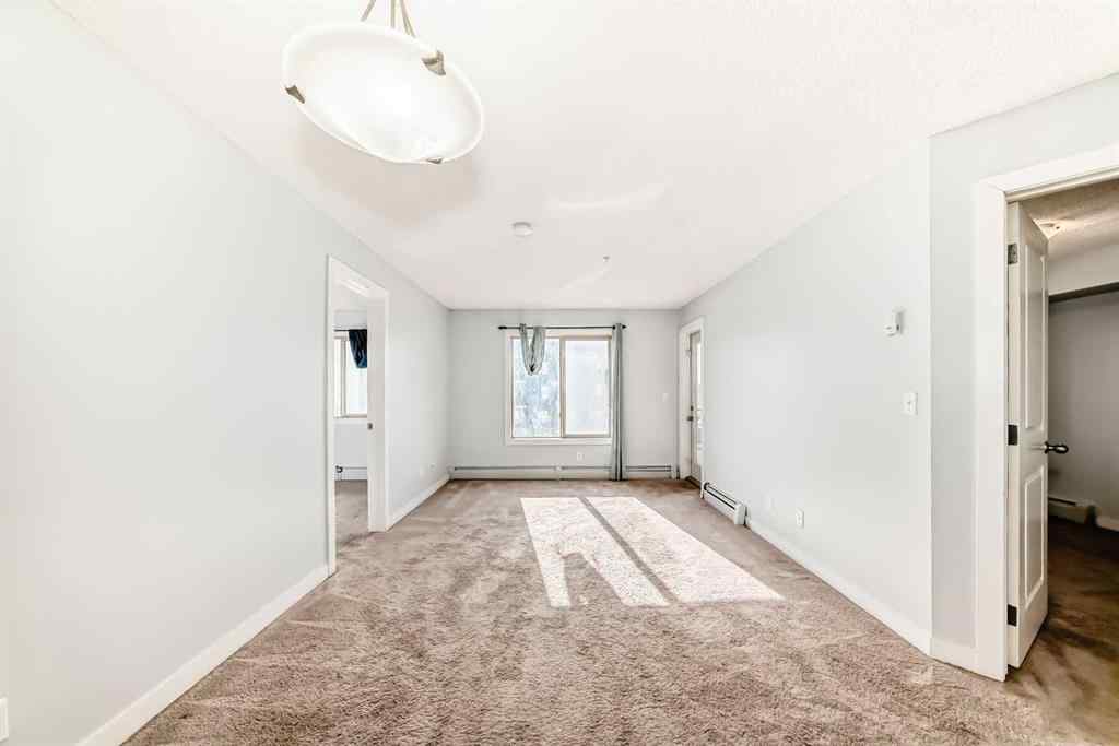 MLS® A2220772 - Unit #205 5 Saddlestone Way NE in Saddle Ridge Calgary, Residential