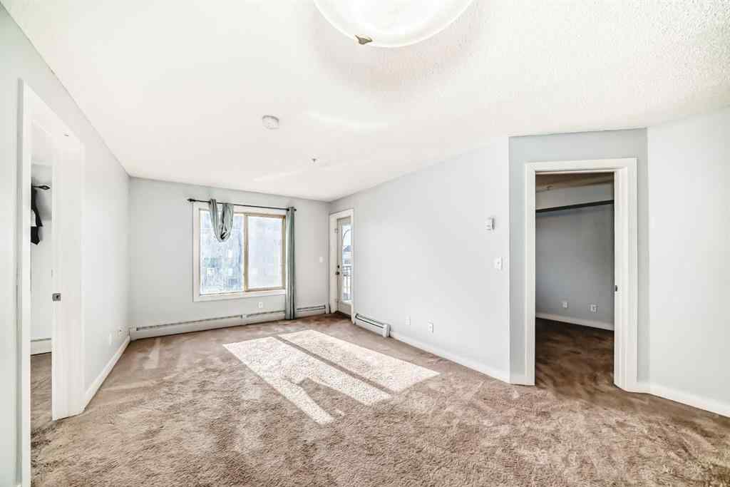 MLS® A2220772 - Unit #205 5 Saddlestone Way NE in Saddle Ridge Calgary, Residential