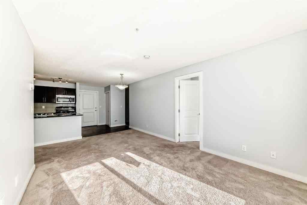 MLS® A2220772 - Unit #205 5 Saddlestone Way NE in Saddle Ridge Calgary, Residential