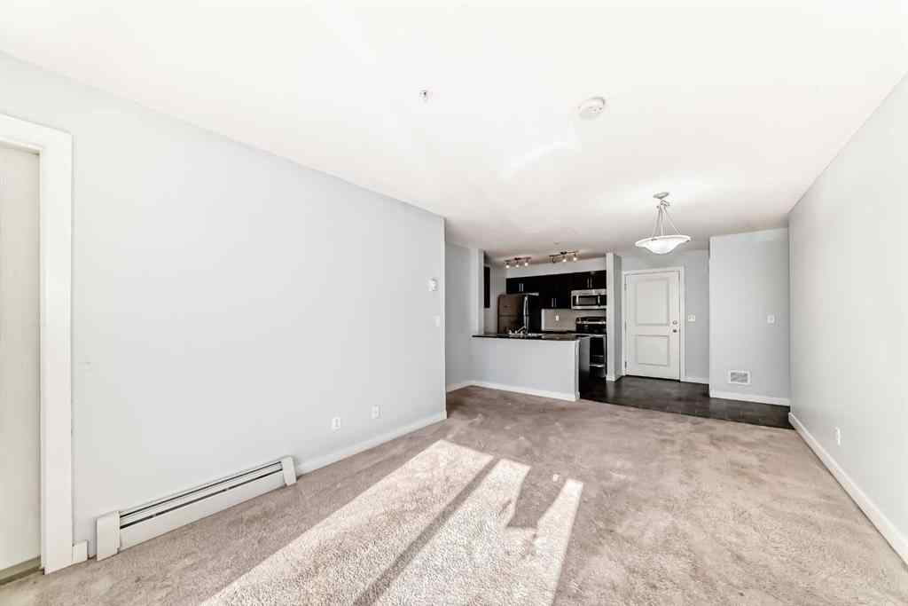 MLS® A2220772 - Unit #205 5 Saddlestone Way NE in Saddle Ridge Calgary, Residential