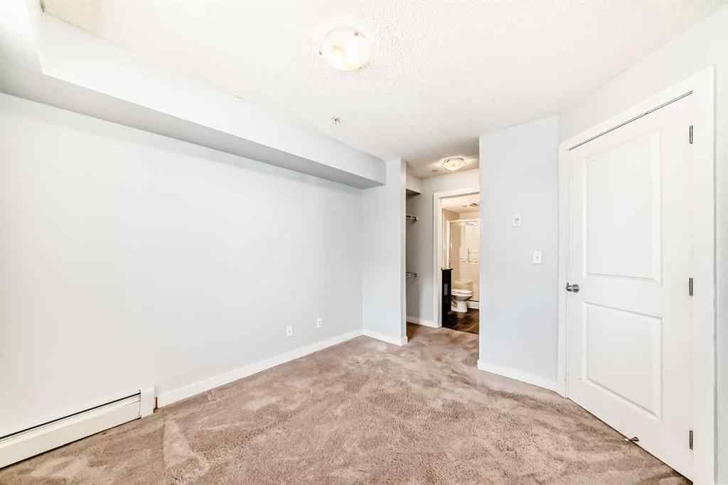 MLS® A2220772 - Unit #205 5 Saddlestone Way NE in Saddle Ridge Calgary, Residential
