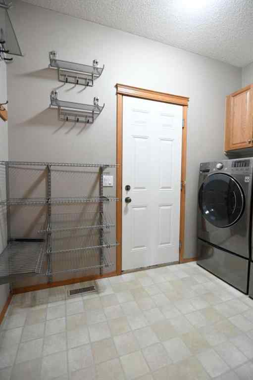 MLS® A2221036 - 2825 Coopers Manor SW in Coopers Crossing Airdrie, Residential