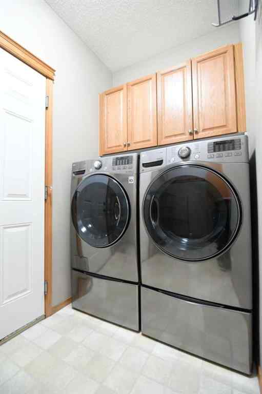 MLS® A2221036 - 2825 Coopers Manor SW in Coopers Crossing Airdrie, Residential