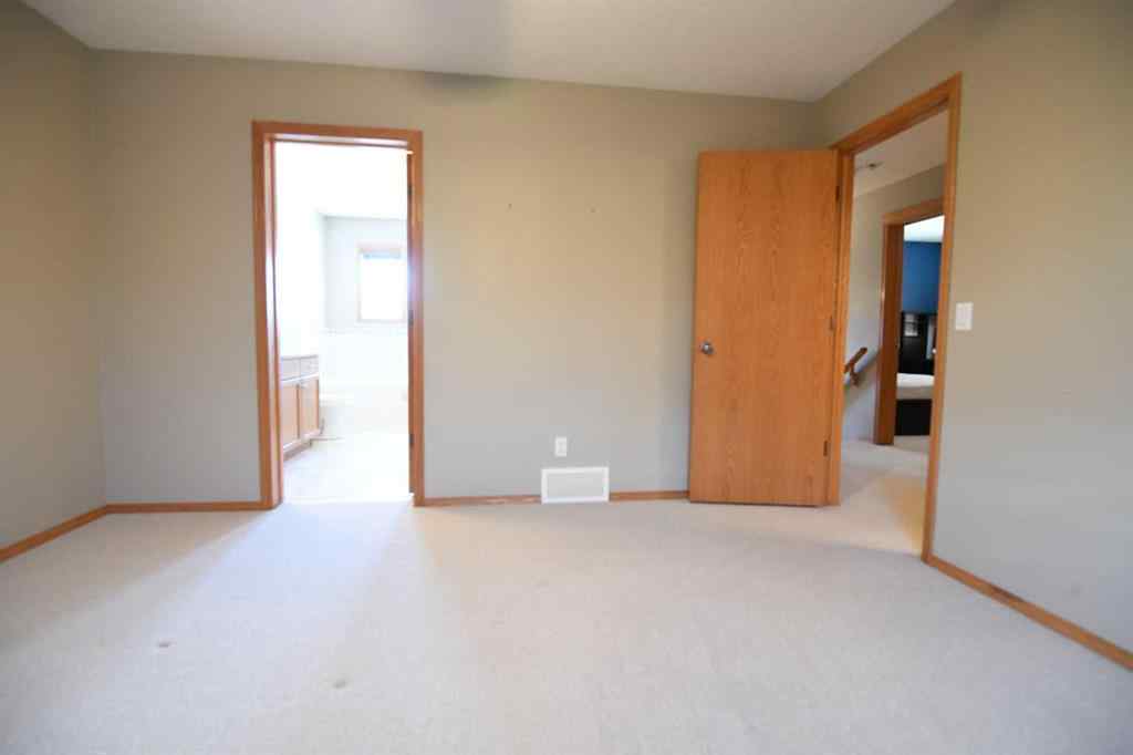 MLS® A2221036 - 2825 Coopers Manor SW in Coopers Crossing Airdrie, Residential