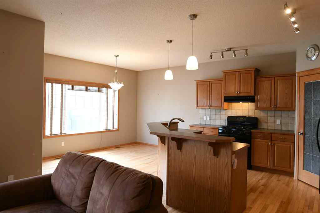 MLS® A2221036 - 2825 Coopers Manor SW in Coopers Crossing Airdrie, Residential
