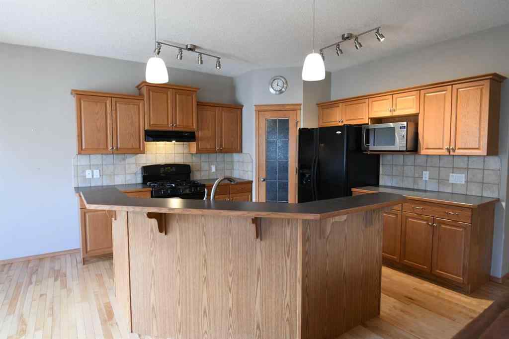 MLS® A2221036 - 2825 Coopers Manor SW in Coopers Crossing Airdrie, Residential