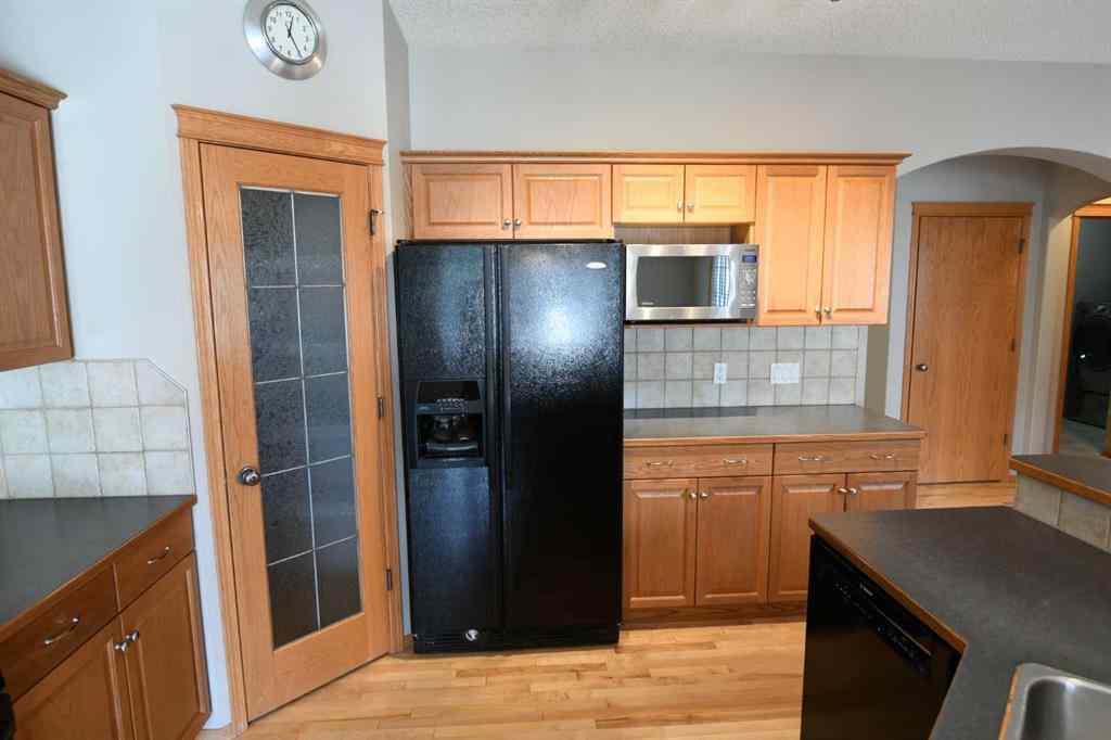 MLS® A2221036 - 2825 Coopers Manor SW in Coopers Crossing Airdrie, Residential
