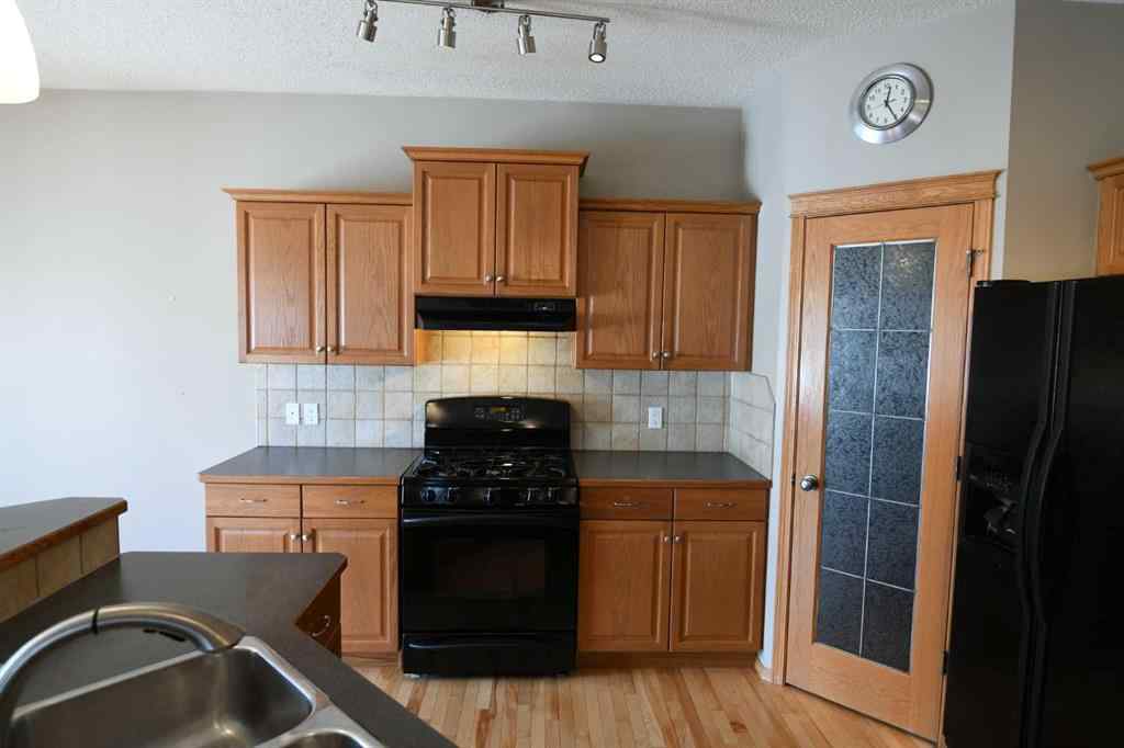 MLS® A2221036 - 2825 Coopers Manor SW in Coopers Crossing Airdrie, Residential