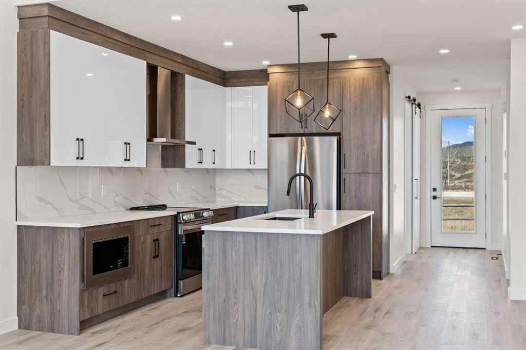 MLS® A2221288 - 48 Cottageclub Lane  in Cottage Club at Ghost Lake Rural Rocky View County, Residential
