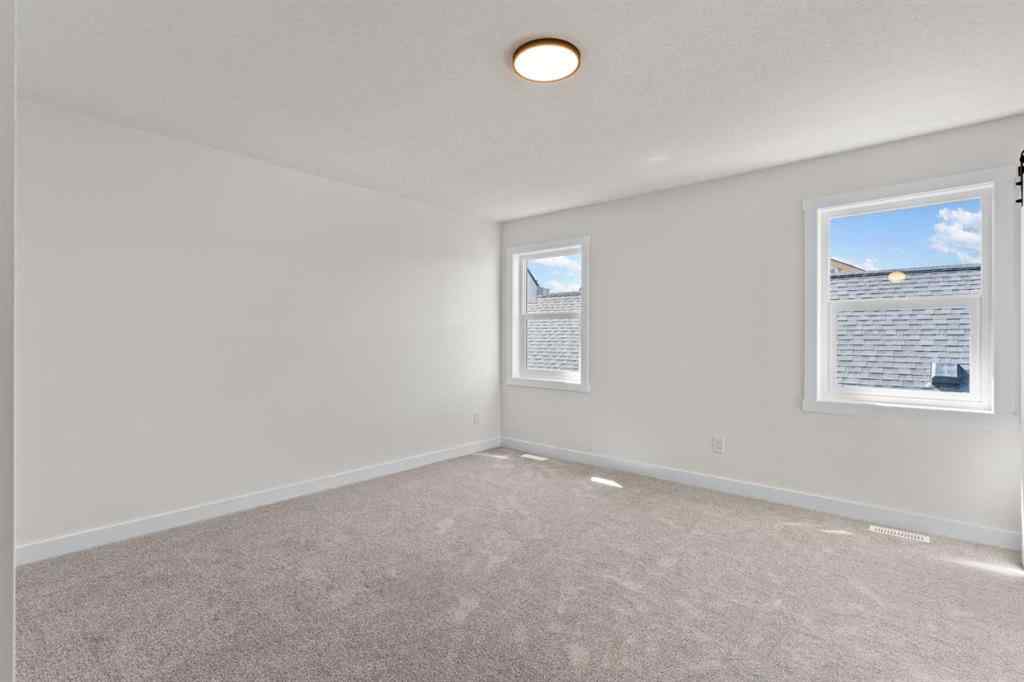 MLS® A2221288 - 48 Cottageclub Lane  in Cottage Club at Ghost Lake Rural Rocky View County, Residential