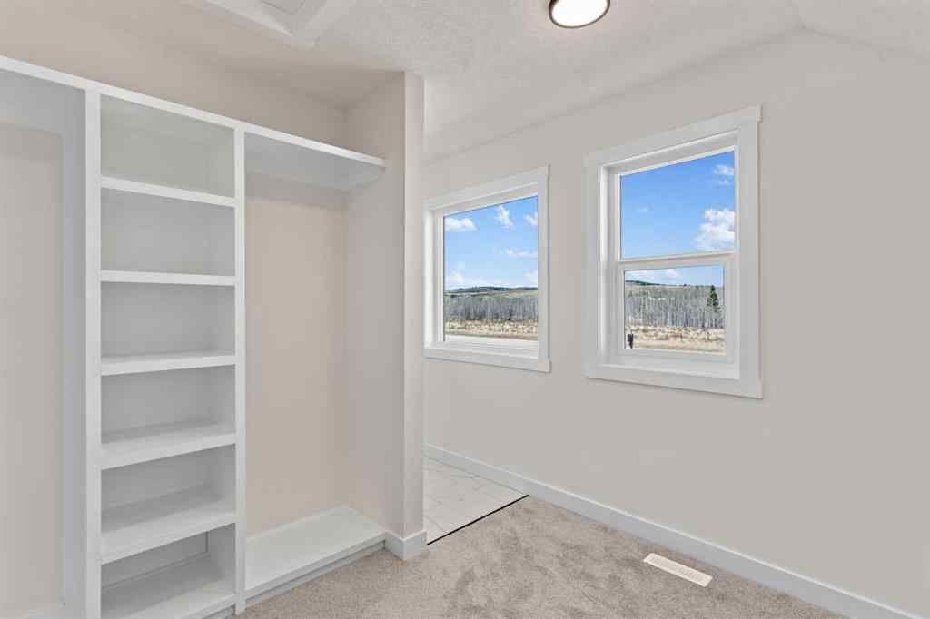 MLS® A2221288 - 48 Cottageclub Lane  in Cottage Club at Ghost Lake Rural Rocky View County, Residential