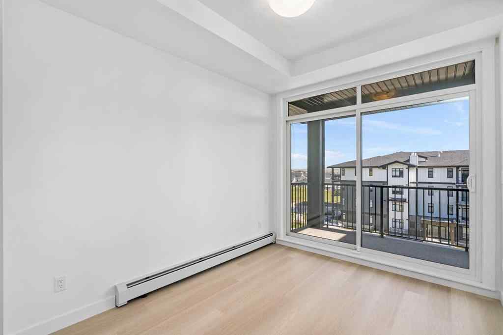 MLS® A2221300 - Unit #411 70 Sage Hill Walk NW in Sage Hill Calgary, Residential