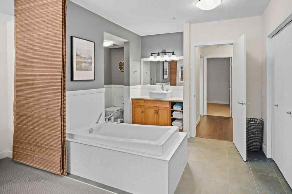 MLS® A2221320 - Unit #111 106 Stewart Creek Landing  in Three Sisters Canmore, Residential