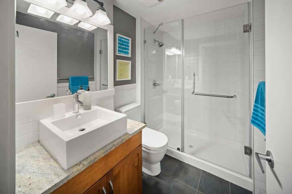 MLS® A2221320 - Unit #111 106 Stewart Creek Landing  in Three Sisters Canmore, Residential