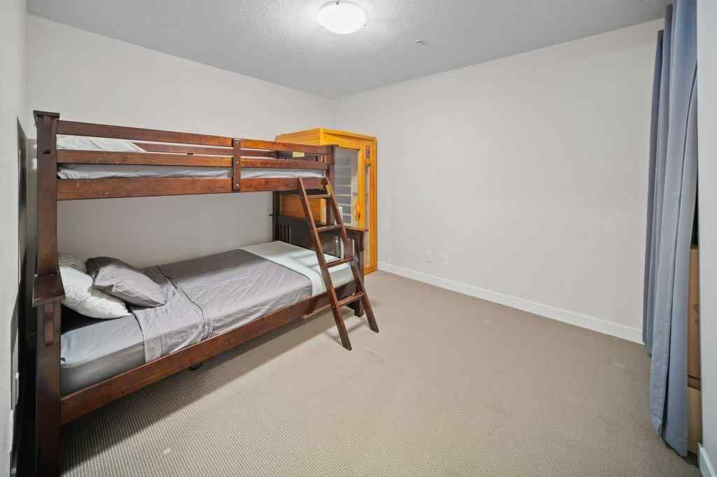 MLS® A2221320 - Unit #111 106 Stewart Creek Landing  in Three Sisters Canmore, Residential