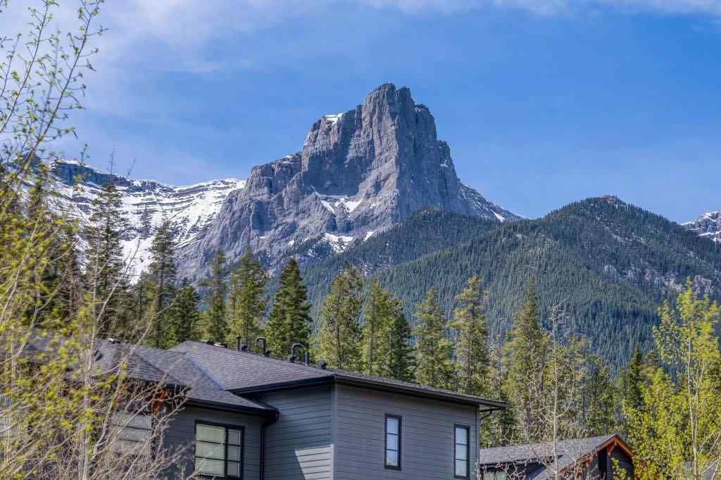 MLS® A2221320 - Unit #111 106 Stewart Creek Landing  in Three Sisters Canmore, Residential