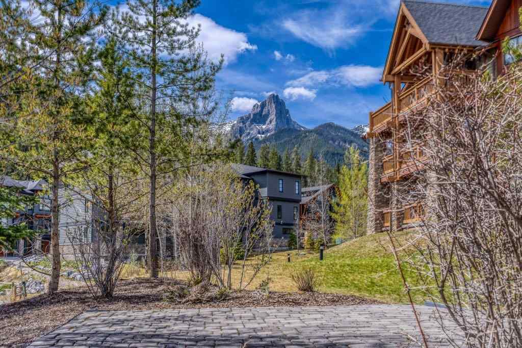 MLS® A2221320 - Unit #111 106 Stewart Creek Landing  in Three Sisters Canmore, Residential