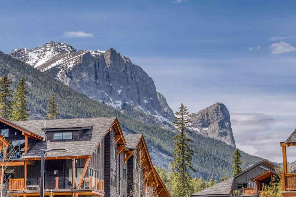 MLS® A2221320 - Unit #111 106 Stewart Creek Landing  in Three Sisters Canmore, Residential