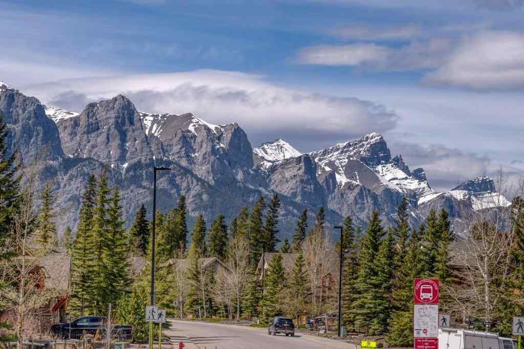 MLS® A2221320 - Unit #111 106 Stewart Creek Landing  in Three Sisters Canmore, Residential