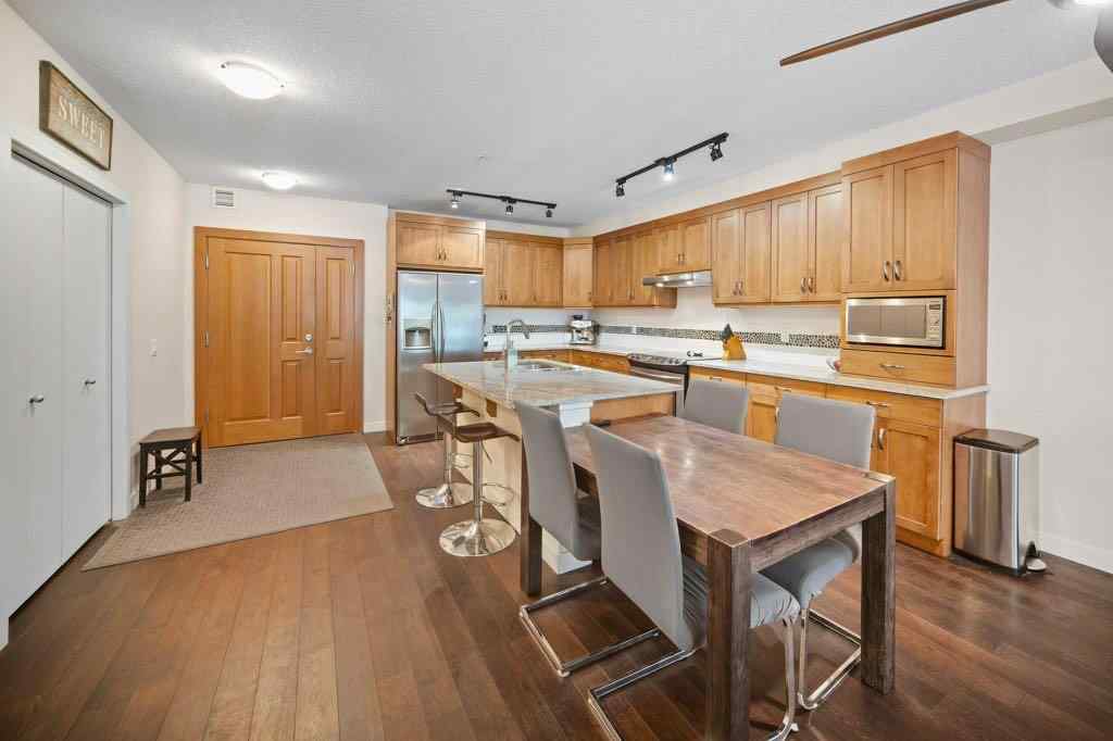 MLS® A2221320 - Unit #111 106 Stewart Creek Landing  in Three Sisters Canmore, Residential